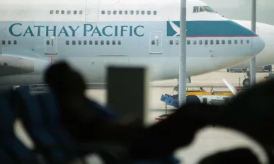 Cathay Pacific profits fall 83%