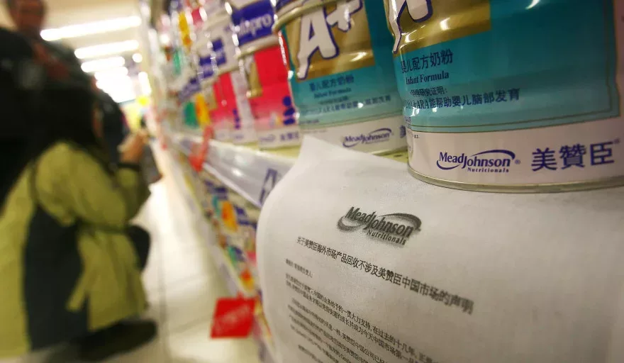 China fines baby formula companies