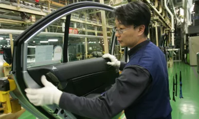 Hyundai and Kia workers vote to strike over pay and conditions